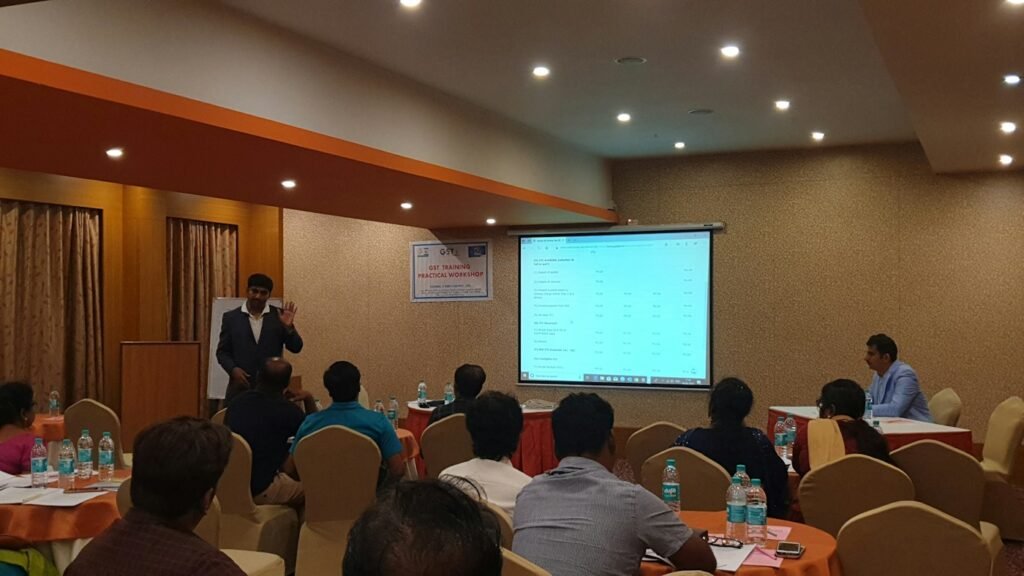 A workshop session with diverse civil society members sharing ideas on climate resilience.